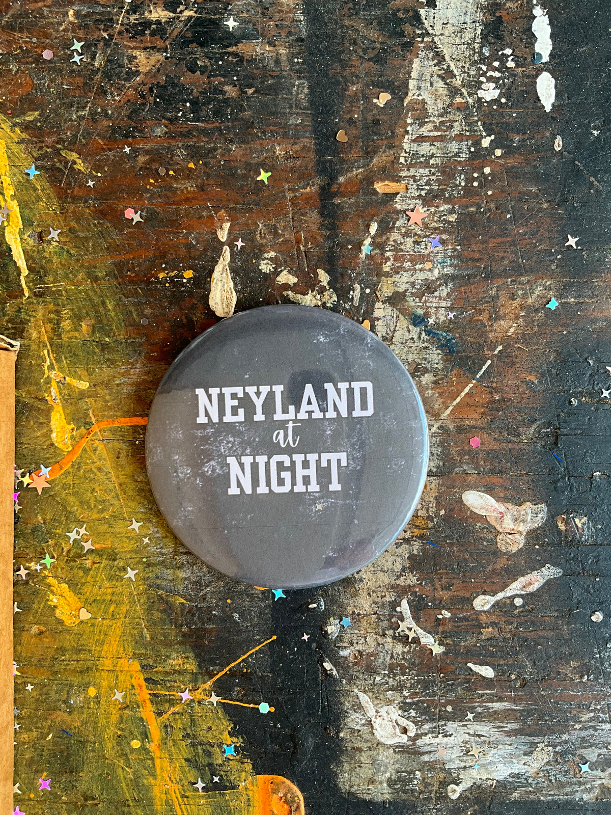 "NEYLAND at NIGHT" button