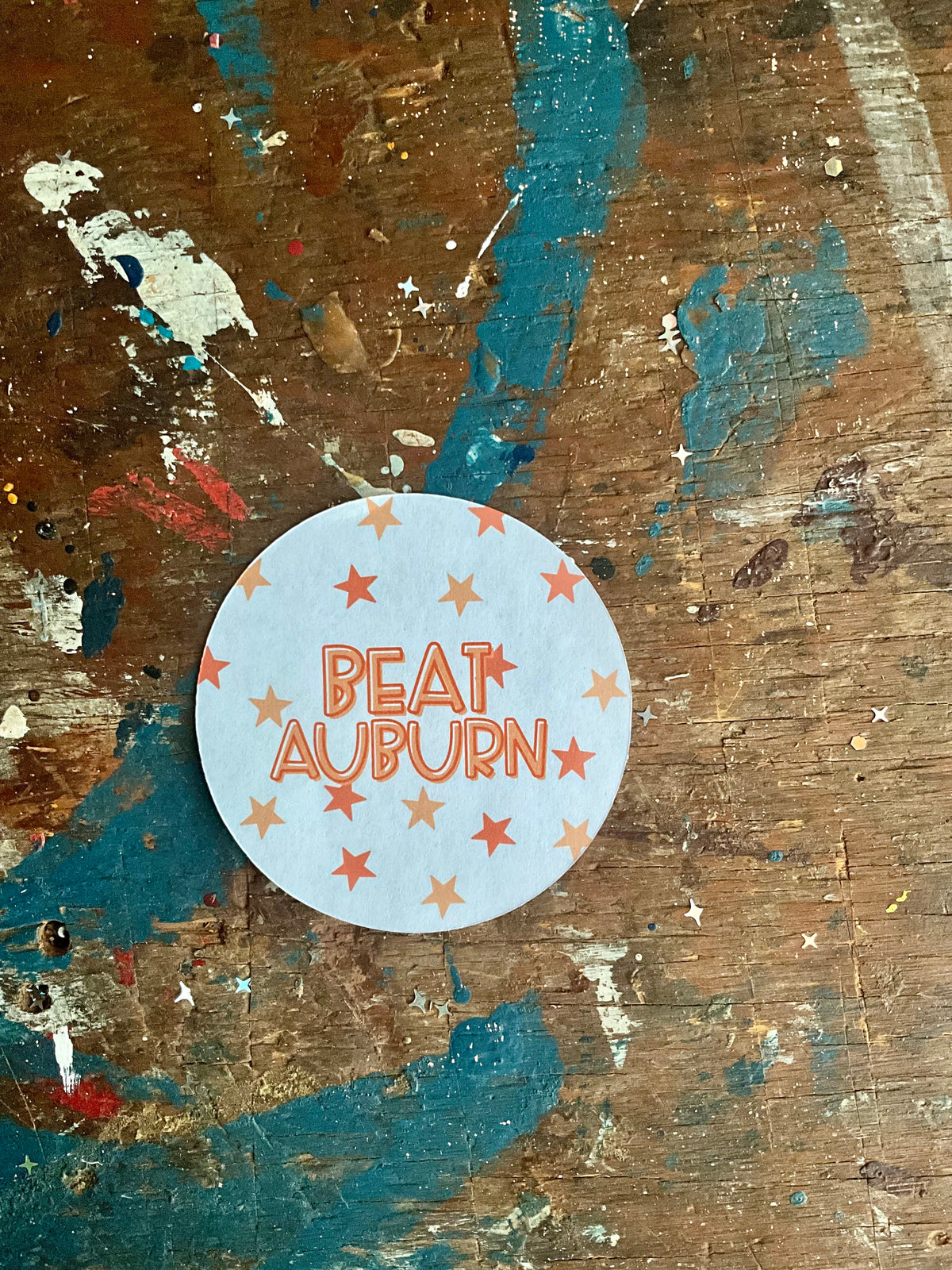 "BEAT AUBURN" orange with stars button