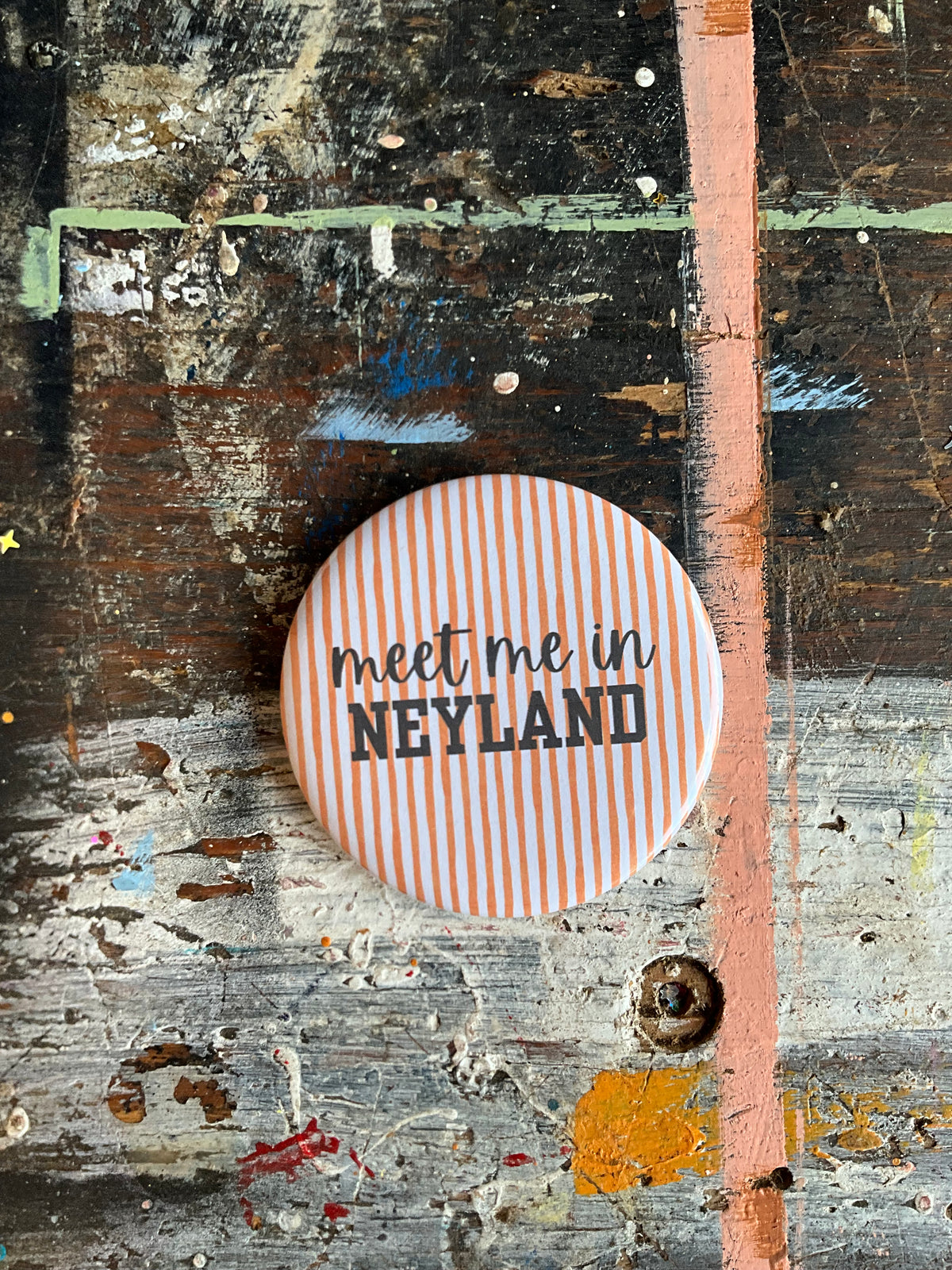 "meet me in NEYLAND" orange/white stripe button