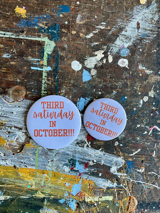 "Third Saturday in October!!!" orange letters/white background button