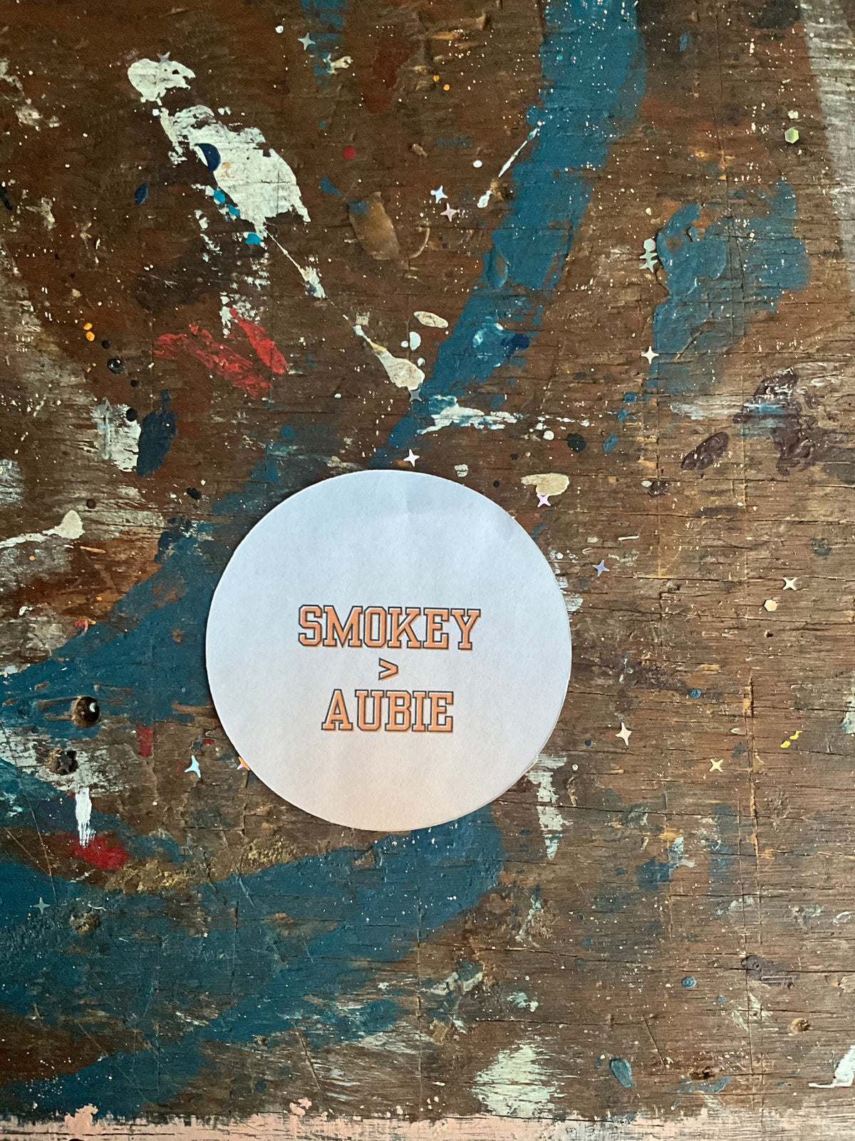 "SMOKEY > AUBIE" button
