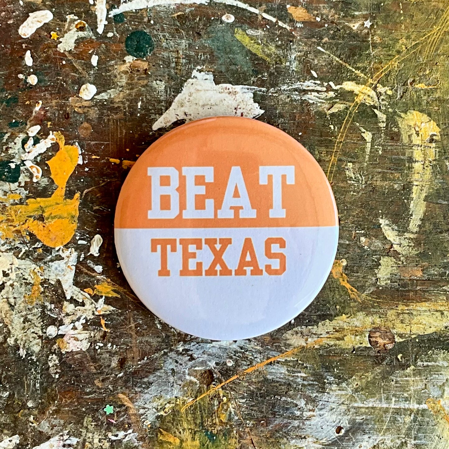 Beat Texas pin back button
