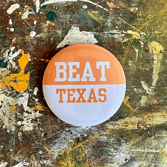 Beat Texas pin back button