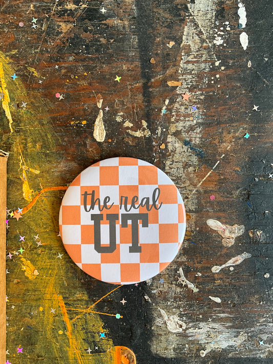 "the real UT" orange/white check button
