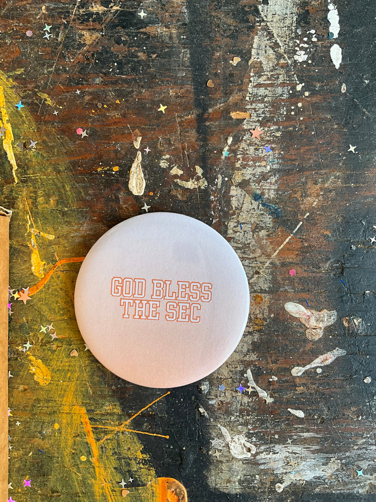 "GOD BLESS THE SEC" orange/white button