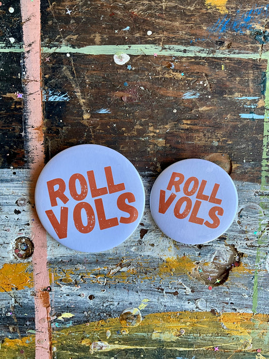 "ROLL VOLS" orange letters/white background