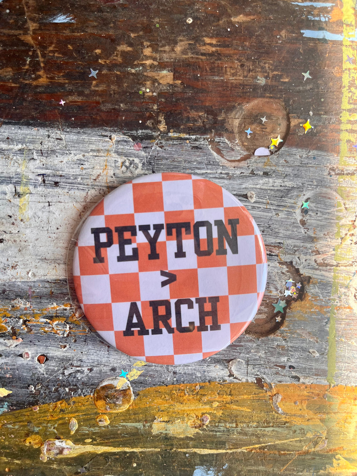 "PEYTON > ARCH" orange/white check button