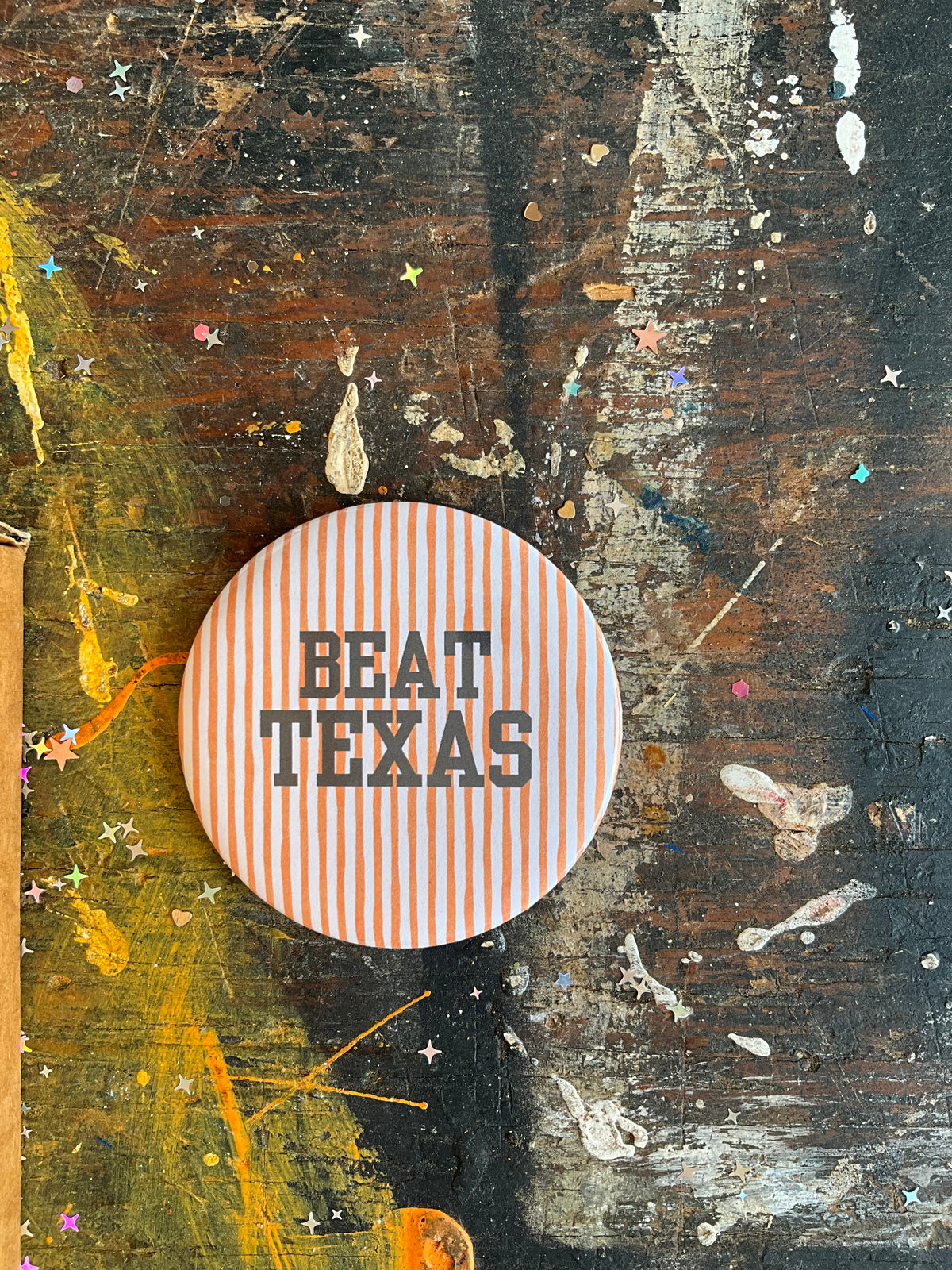 "BEAT TEXAS" orange/white stripe background button