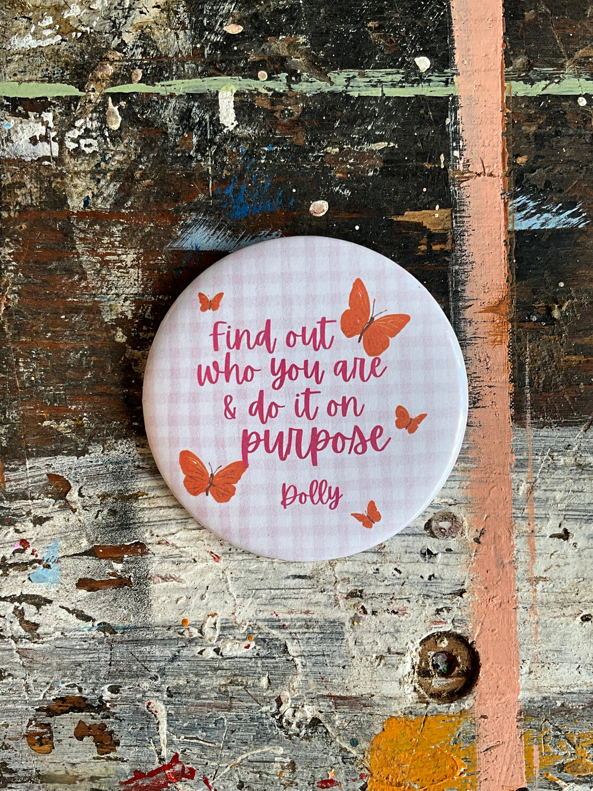 "Find out who you are & do it on purpose" Dolly button